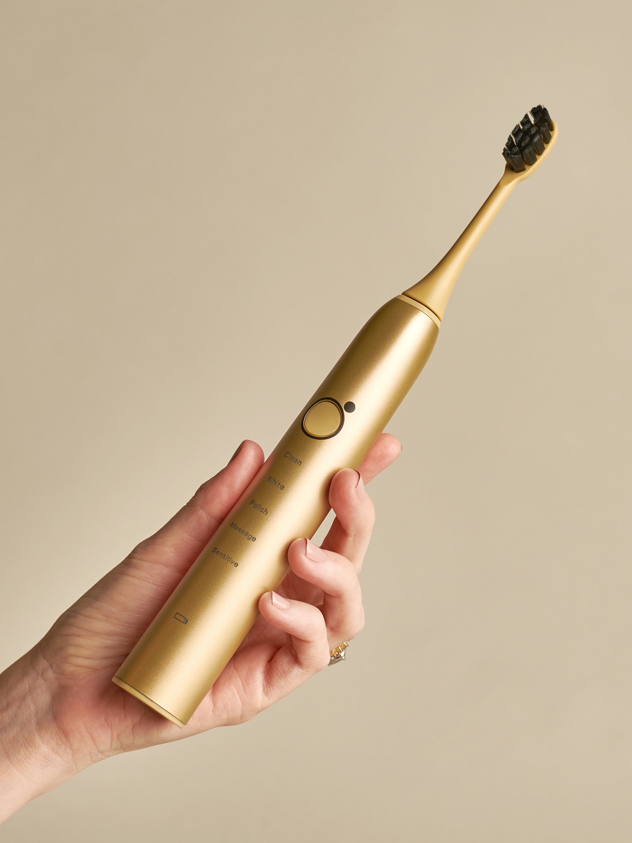 Gold toothbrush on sale